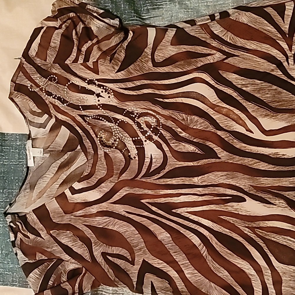 Ladies shark bite embellished top